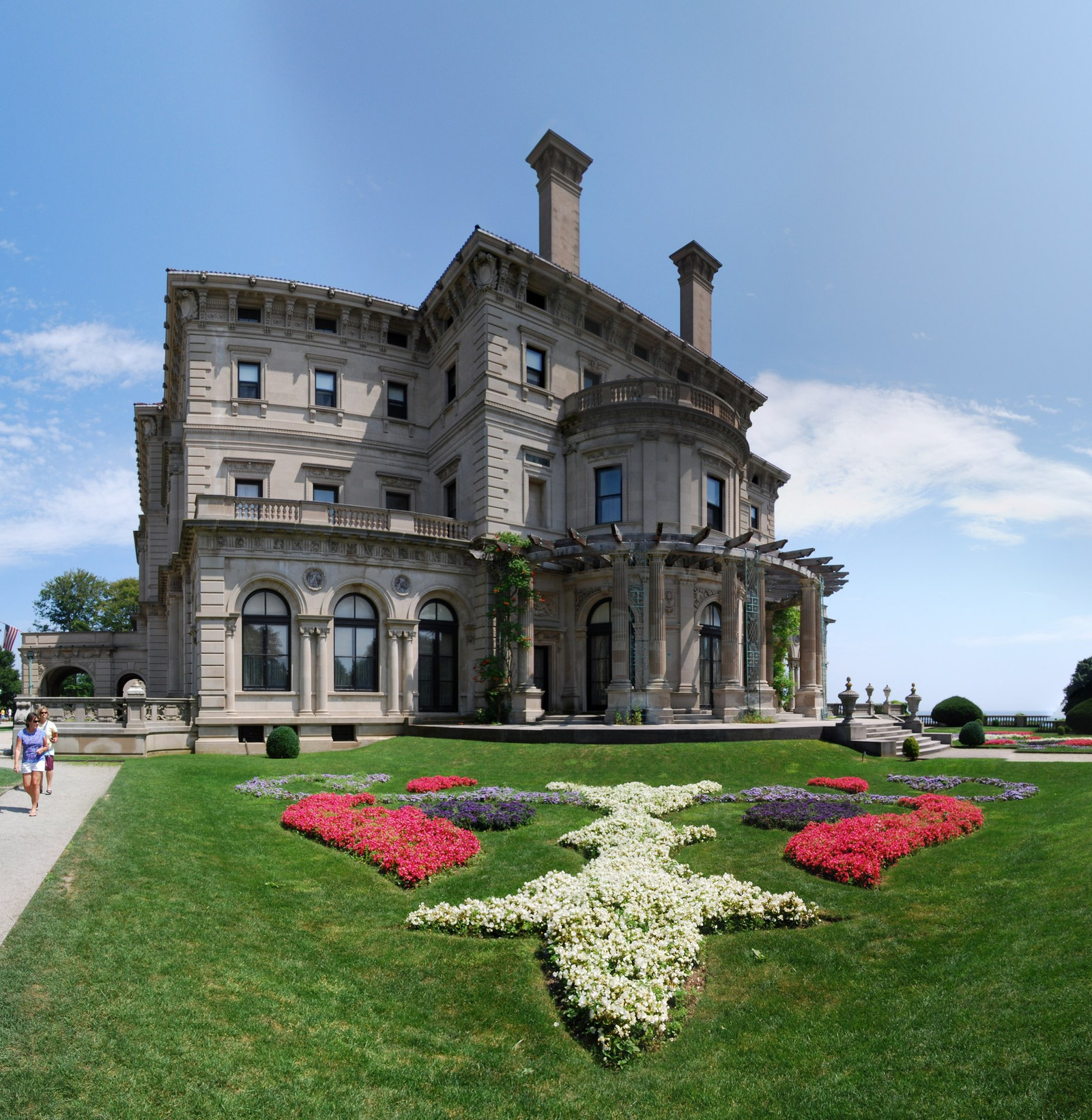 Formal flower beds and clipped lawn on the grounds of The Breakers