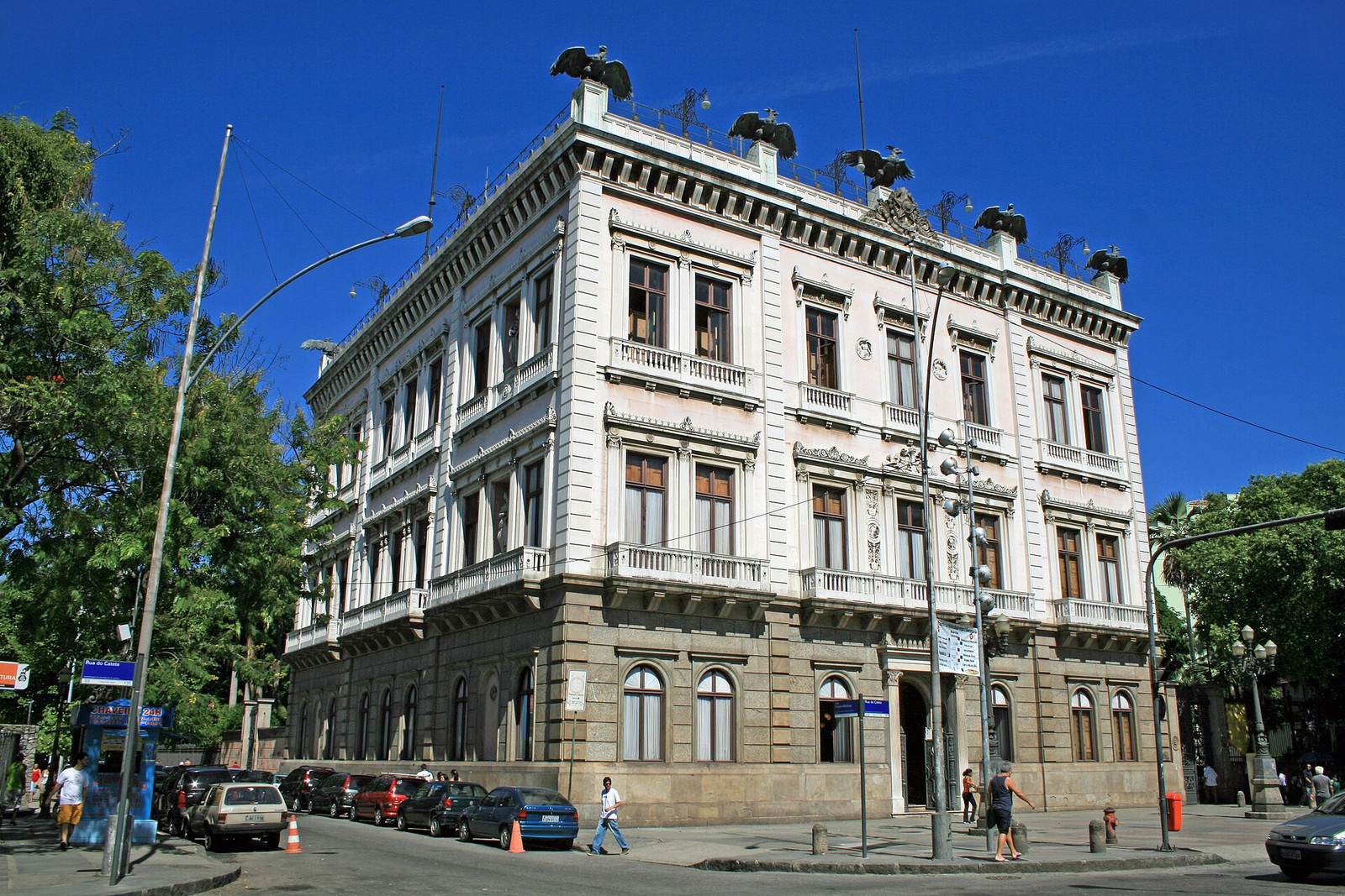 Three-story neoclassical façade of Palácio do Catete beneath a blue Rio sky