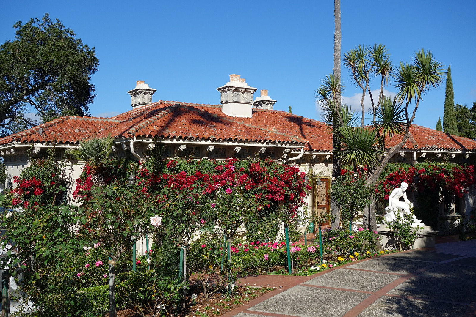 A guest residence at Hearst Castle surrounded by flowering gardens