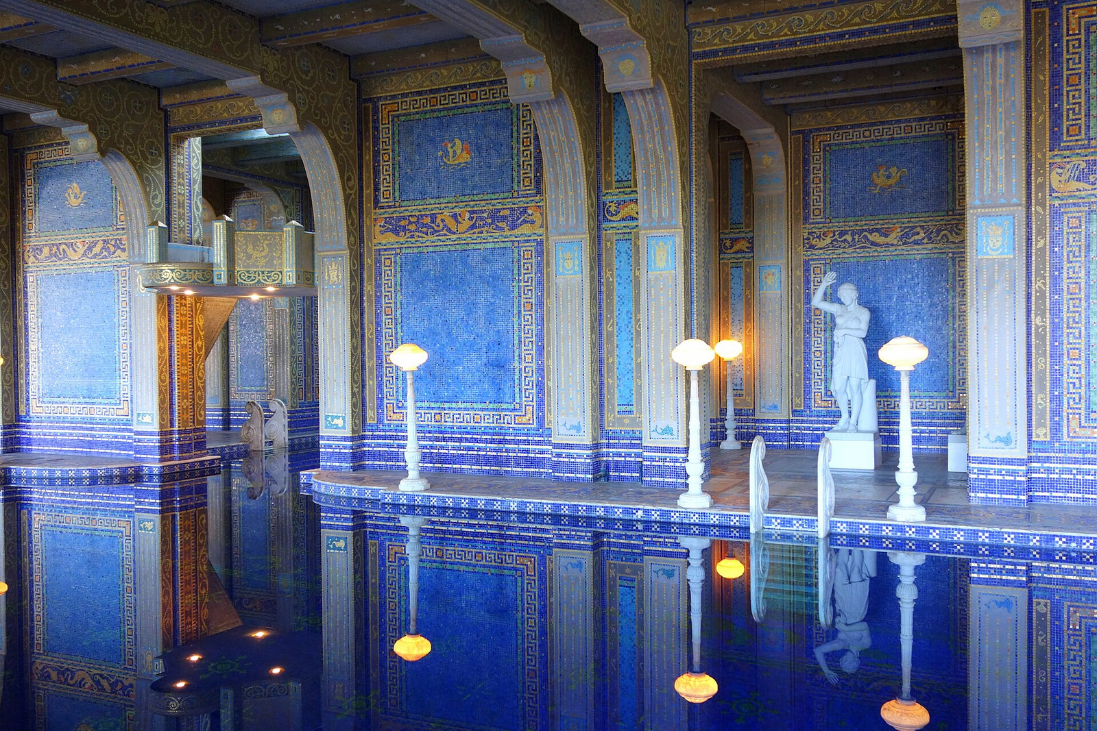 Indoor Roman Pool at Hearst Castle lined with blue and gold mosaics