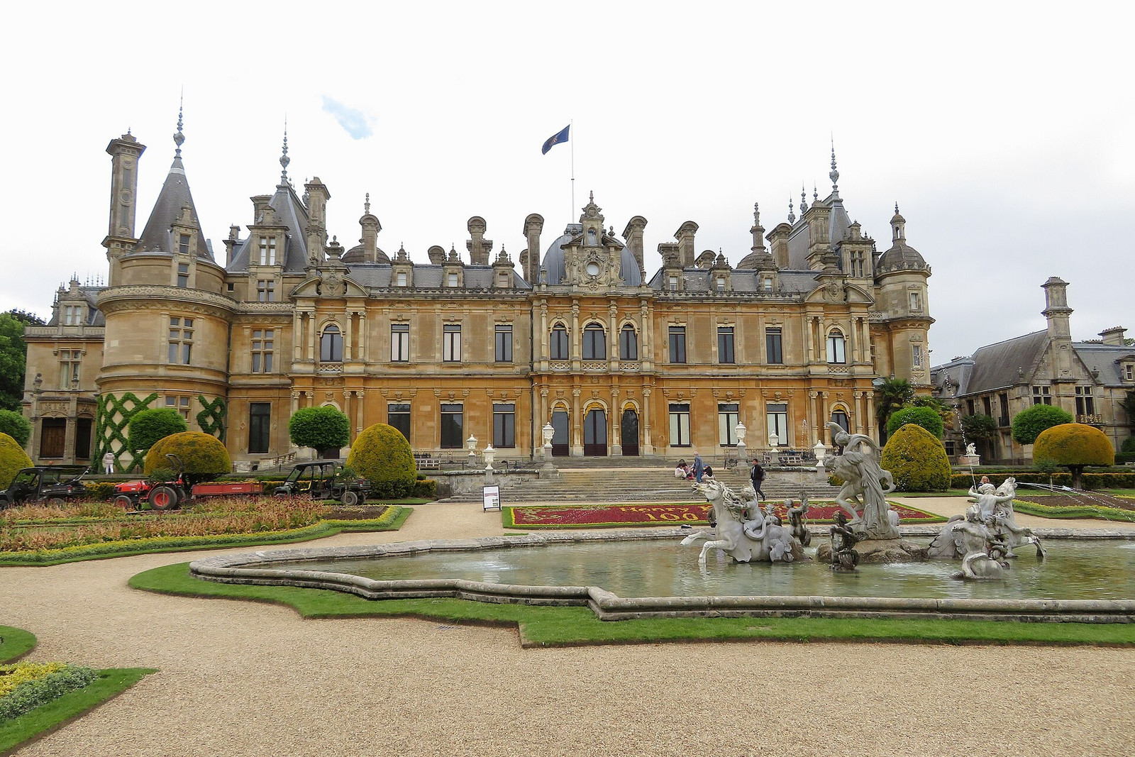 Waddesdon Manor beyond a formal parterre of clipped planting and geometric paths